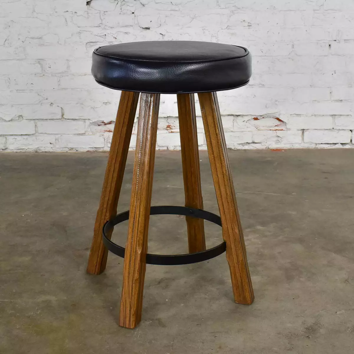 Brandt Ranch Oak Bar Stool Acorn Brown Finish Black Brown Faux