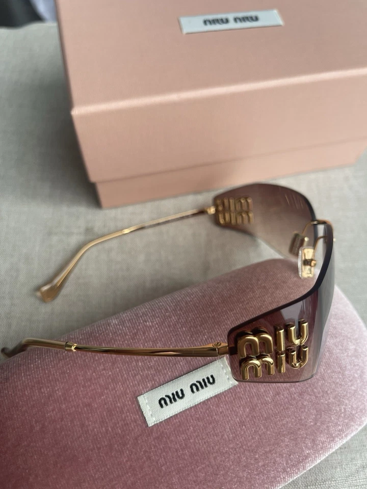 Gafas de sol para mujer MiuMiu MU54YSGold marrón claro” Foto 4 de 4