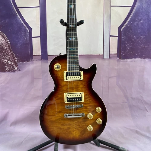 The lowest price standard brown LP electric guitar quilted maple top Fast delive
