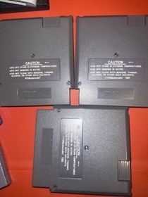 Lot of 3 NES games: Rocketeer, Shooting Range, Iron Tank. Used, working