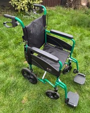 Dash Express Folding Lightweight Push Along Wheel Chair With Foot Rest Green