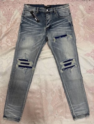 AMIRI Distressed Men s Skinny Light Wash Jeans With Patches In Size 36