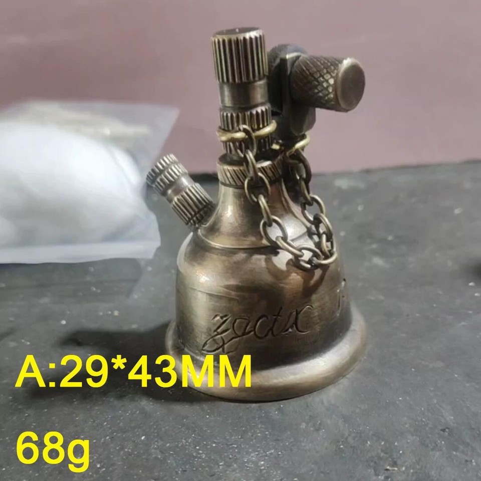 Handcrafted brass desktop oil lighter that doubles as a miniature table lamp — a genuinely rare dual-function collectible with serious desk presence.