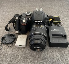 Nikon D3300 camera with 18-55mm DX VR lens. Includes Charger, 2 Batteries