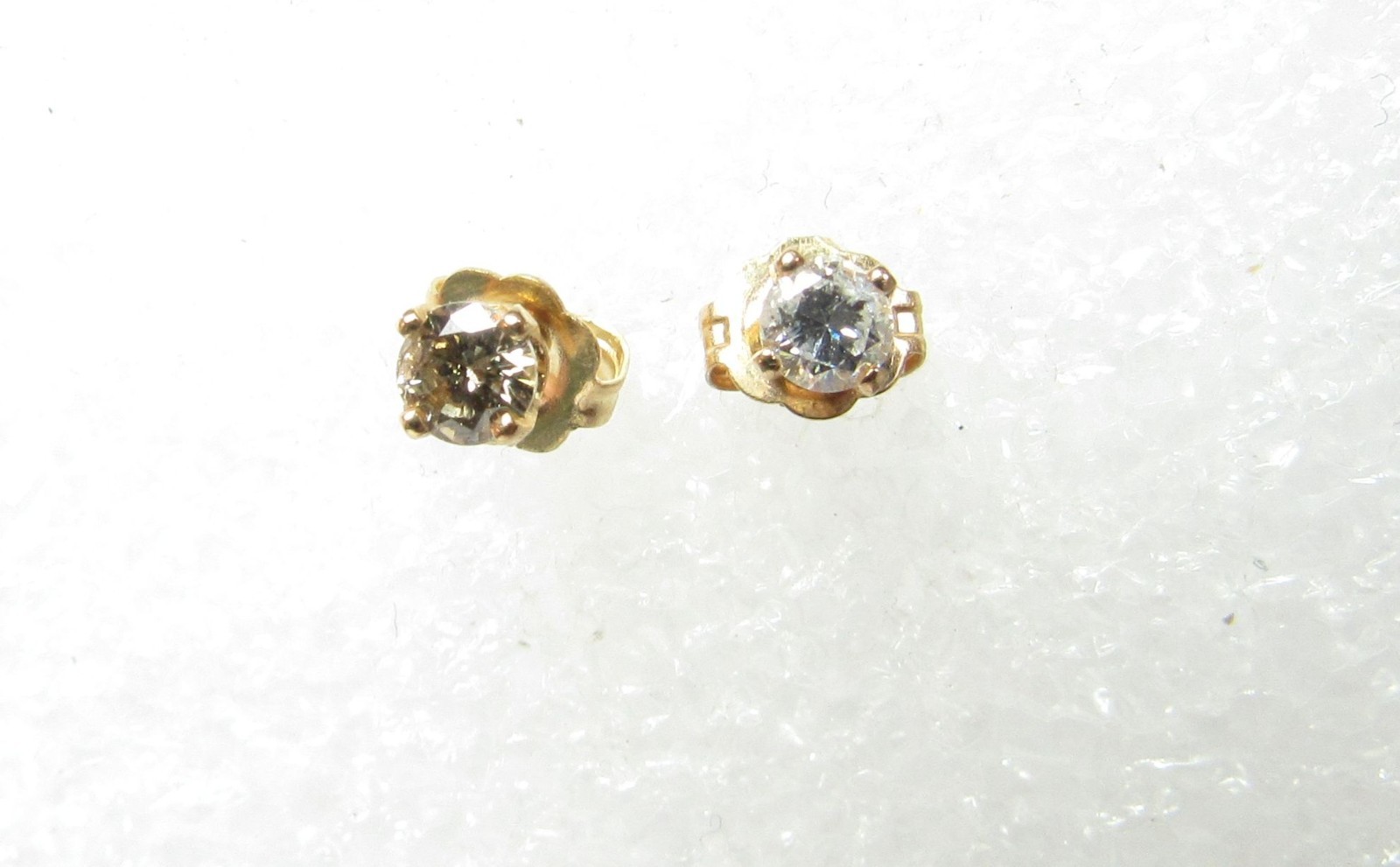 14K Solid Gold Diamond Stud Earrings 1/5 Ct Total Weight/ Colors Not Matching