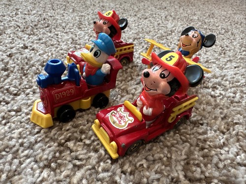 4 Vintage Tomy Walt Disney Feuerwehrmann Mickey Mouse Druckguss Donald Zug Flugzeug
