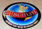VINTAGE SCHLITZ THE BEER THAT MADE MILWAUKEE FAMOUS! 12" METAL GASOLINE OIL SIGN