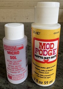 For waterslide decals: Micro Sol (setting solution, new) & Mod Podge (3/4 full)