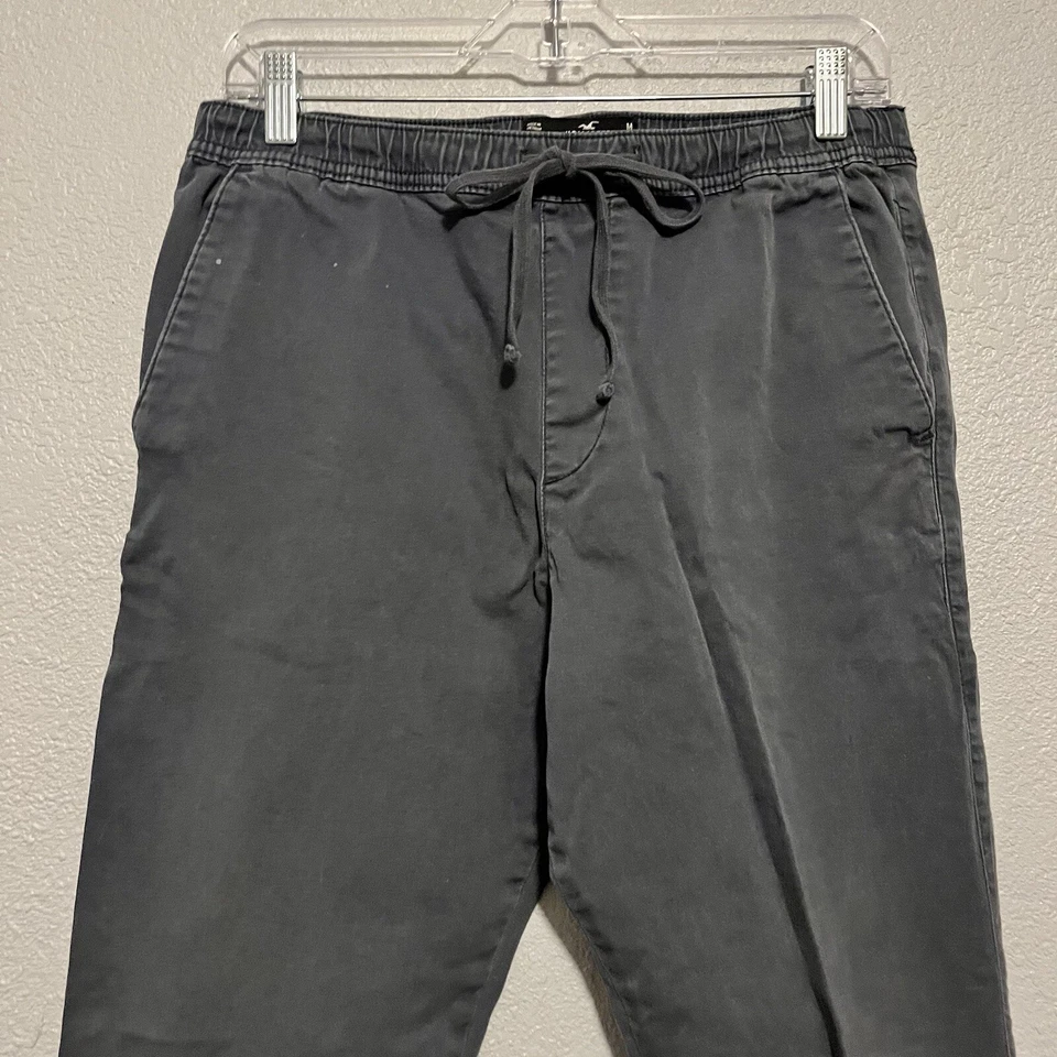 Pantalones de chándal chinos ajustados elásticos avanzados Hollister para hombre talla M gris y cordón Foto 2 de 4