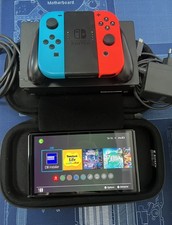Switch OLED Pucée 128Go Très Bon État - Bleu Néon/Rouge Néon