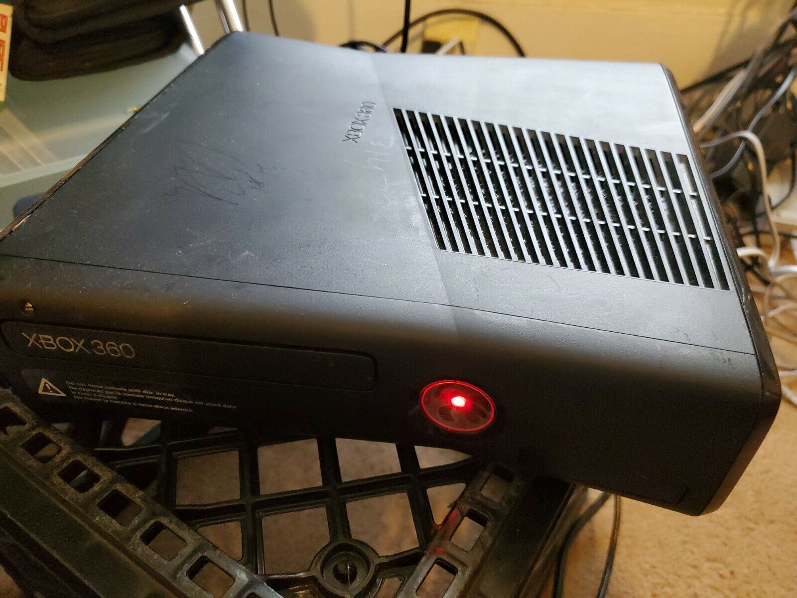 My xbox 360 slim started to red dot days after it started