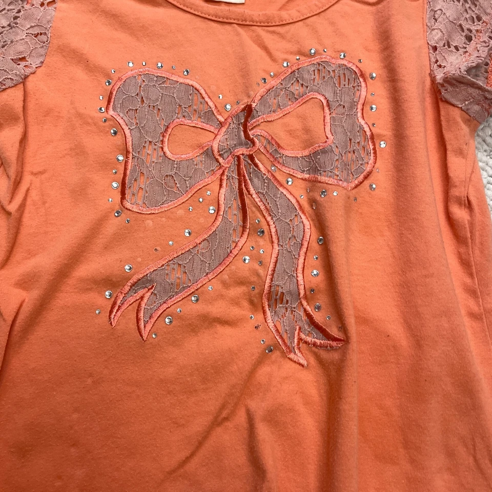 Camisa Faded Glory Meninas Grande 10-12 Laranja Manga Curta Logotipo Laço Parte Inferior Fluxa - Imagem 2 de 4