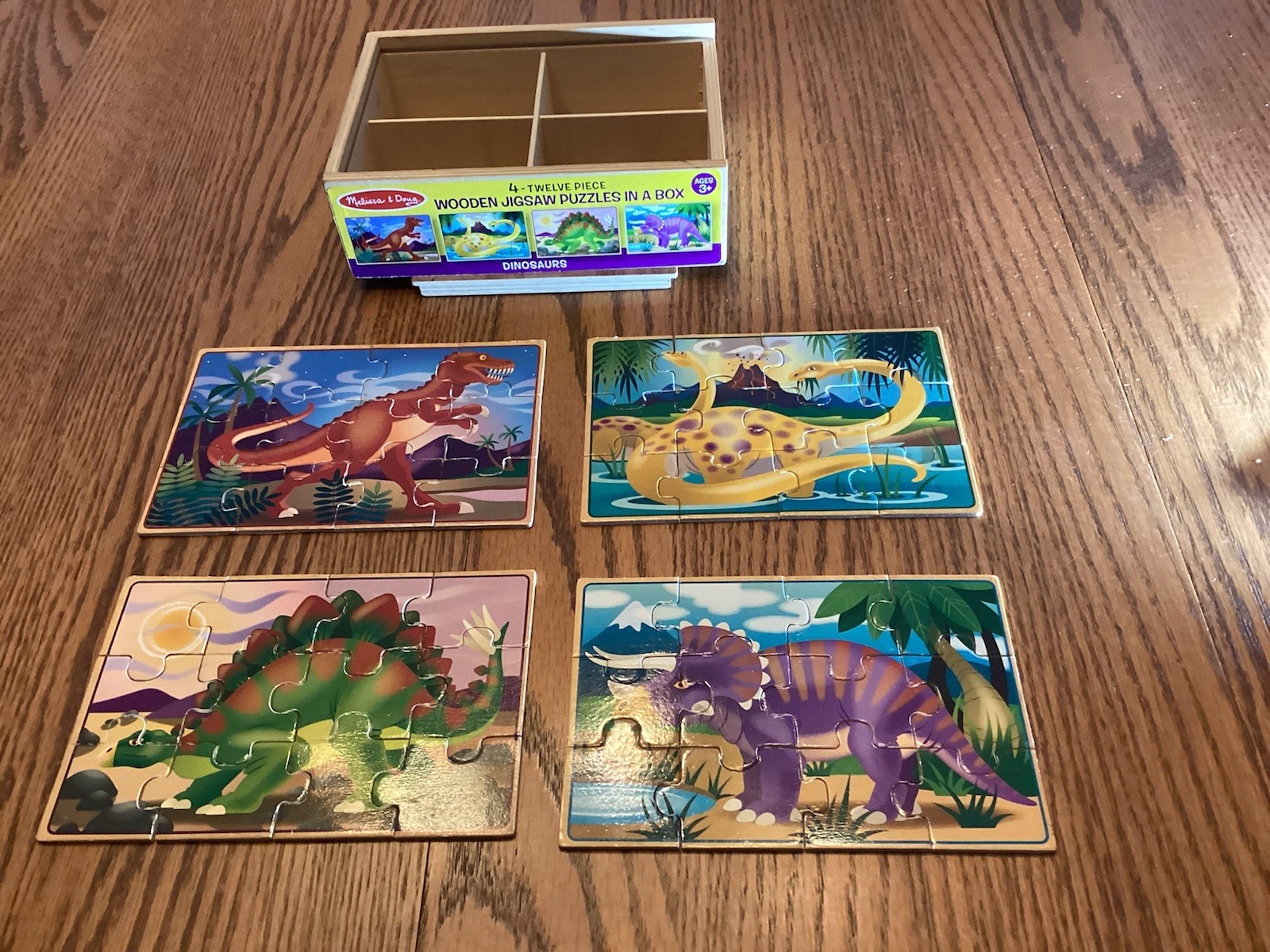 4 Wooden Puzzles in a Box by Melissa and Doug - 4 boxes = 16 puzzles.  Pre owned