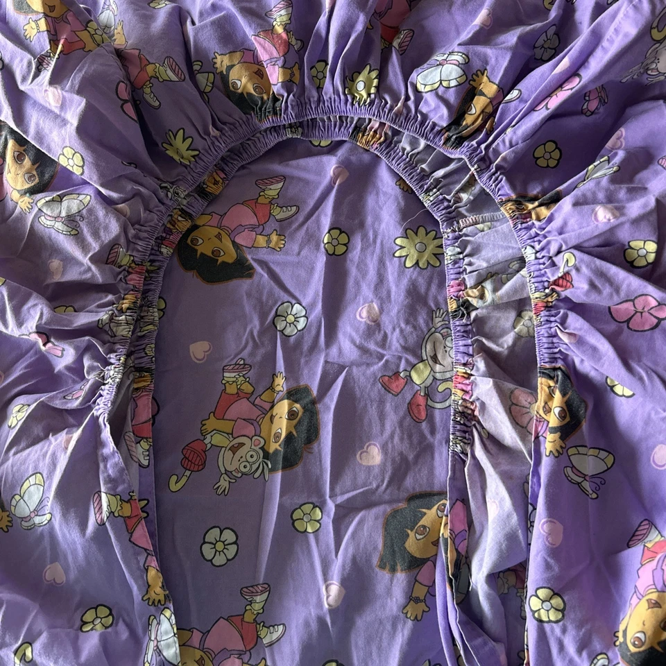 Sábana bajera ajustada NICK, JR DORA LA EXPLORADORA PÚRPURA PARA CUNA - 2006 VIACOM Foto 4 de 4