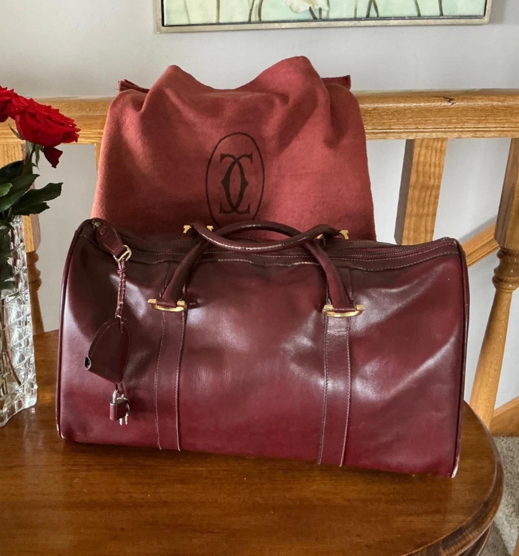 Cartier — Vintage CARTIER Leather Bordeaux Boston Bag with dust bag and authenticity cert
