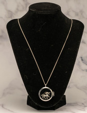 Handmade Unicorn charm floating in cubic zirconia studded locket necklace