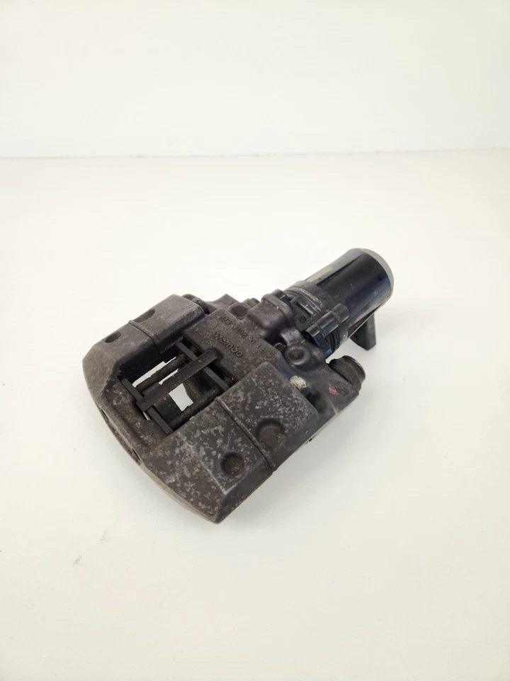 Pinza de freno de estacionamiento Tesla Model S 2012-2016 pasajero trasero derecho AWD fabricante original  Foto 2 de 4