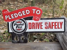 VINTAGE PUROL-PEP LICENSE PLATE TOPPER 11" X 6"