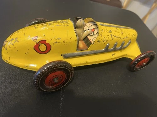 New ListingVintage Marx Pressed Steel Toy Yellow Race Car with Driver