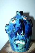 billy joe craven , junior ( DEVIL)  face jug, pottery,  folk art 9''x5''