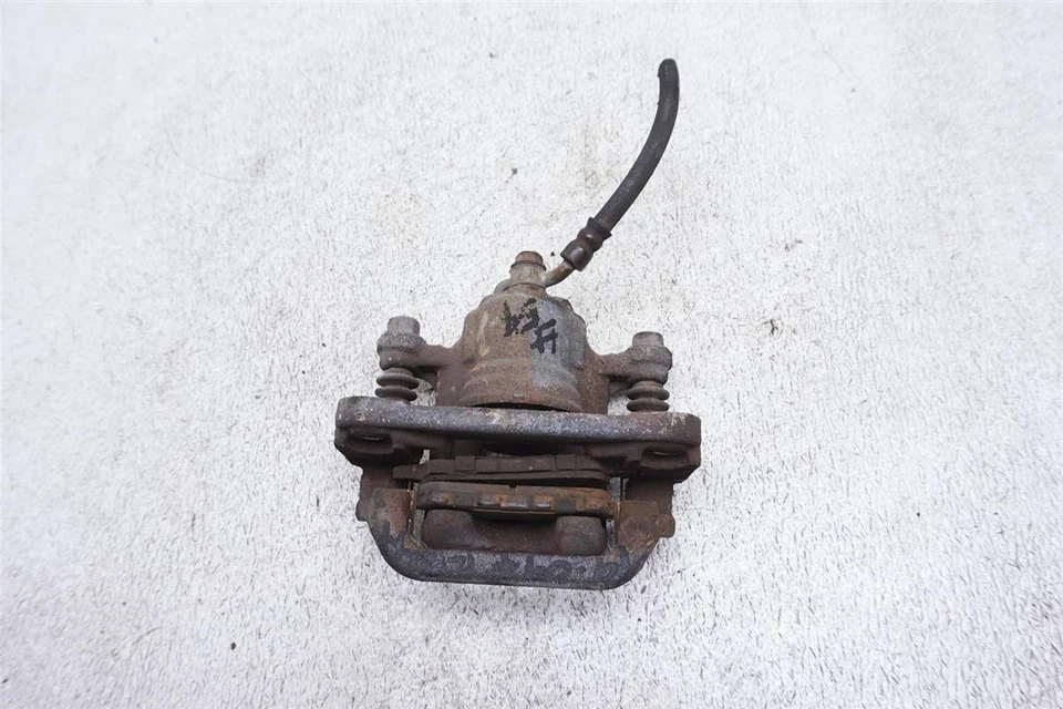 Pinza de freno conductor trasero izquierdo Nissan Altima 2008-2012 44011-Ja01a OEM Foto 4 de 4