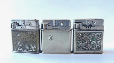 3 rar ROWENTA Schwingdeckel Feuerzeuge Vogelmotiv, florale Gravur, Logo M(? ) - Bild 1 von 4