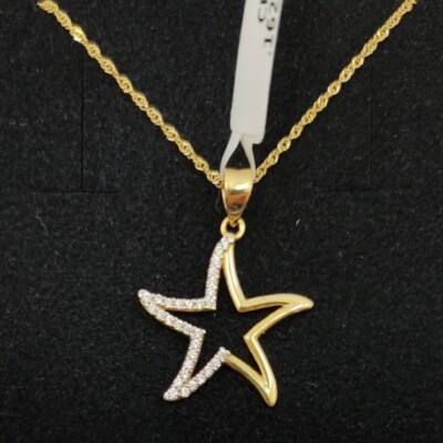 Colgante y cadena oro 18k 750 mls. Estrella de mar con circonitas 19,6 mm. 