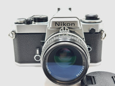 Mint-Nikon FE 35mm Film Camera w Nikkor 50mm f2 lens and Manual TESTED