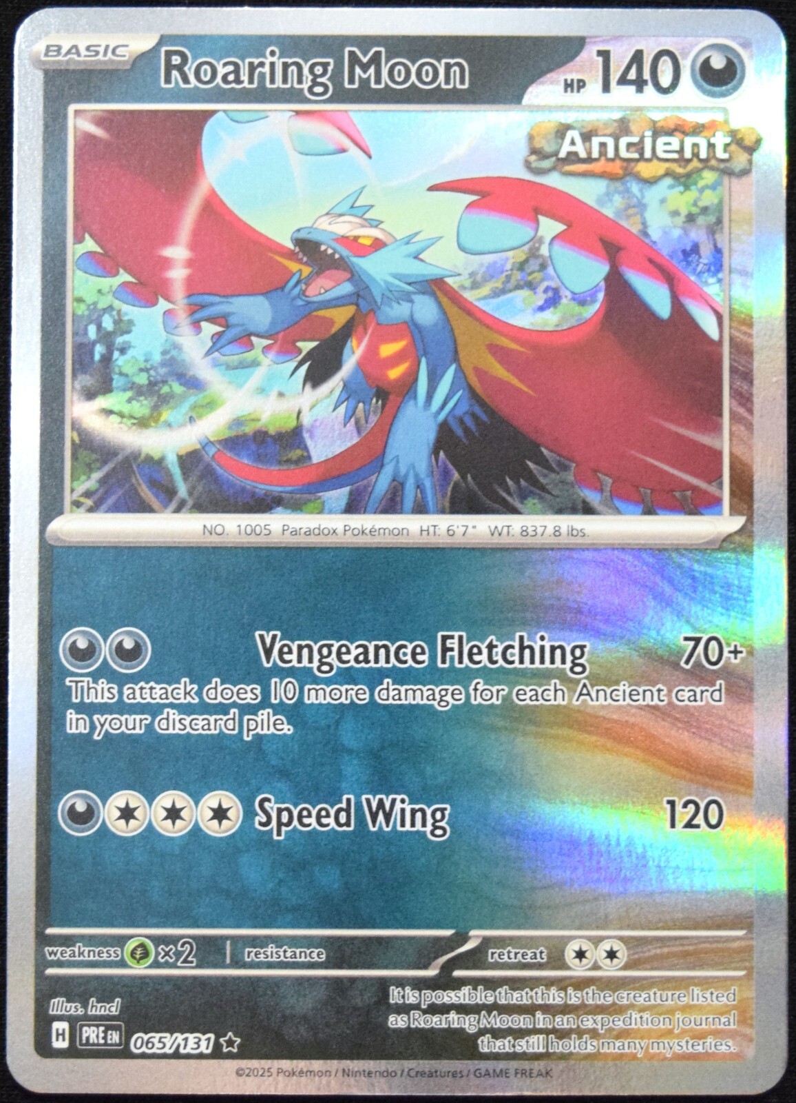 Pokemon TCG Roaring Moon 065/131 2025 Prismatic Evolutions Holo Rare Card - NM