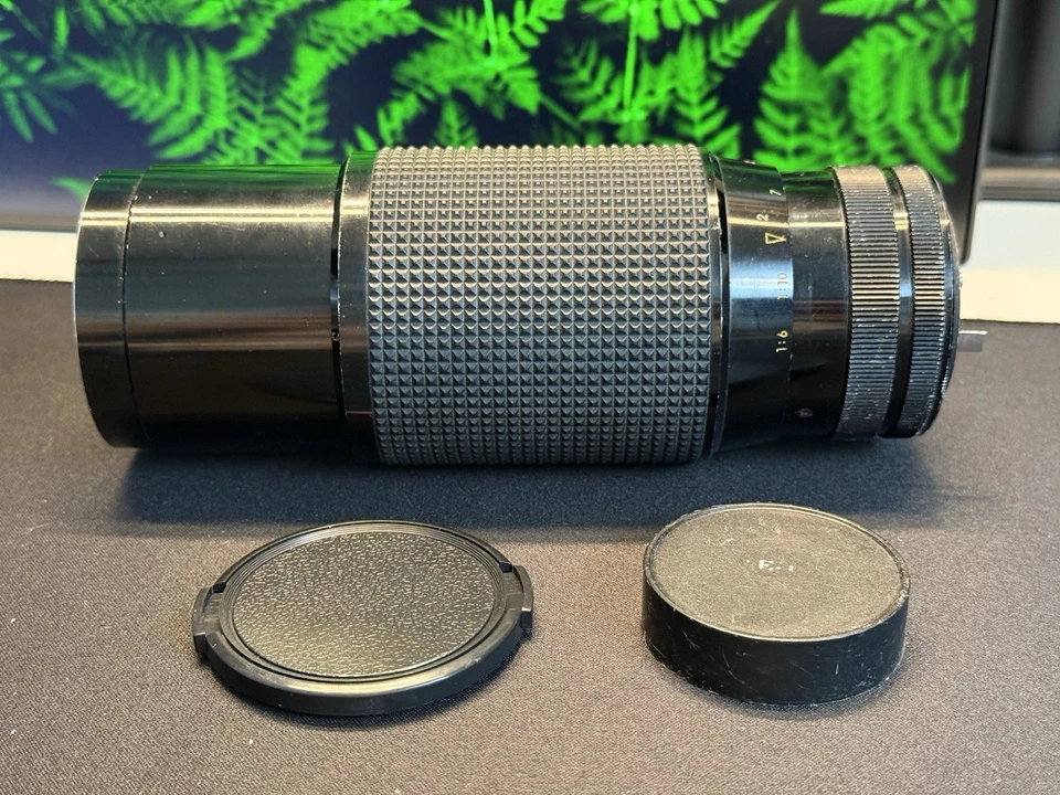 Lente zoom macro Soligor 78-210 mm f/3,5 + tapas [montaje Canon FD] Foto 2 de 4