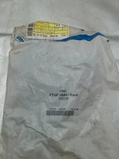 FORD F7UZ-19A813-AA  1999-2014 E-350 Super Duty  Evaporator Door New OEM