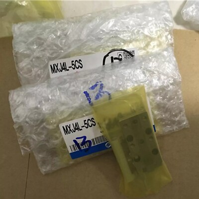 New SMC MXJ4L-5CS pneumatic slide cylinder