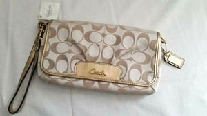 gold coach wallet