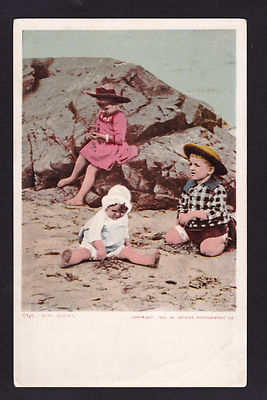 1903 Three Children spend busy hours on the Beach postcard