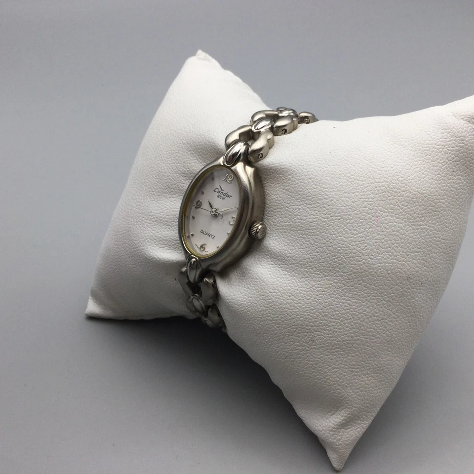 Reloj Condor para mujer 18mm Dial ovalado de tono plateado Acero inoxidable Nueva batería 5.25" Foto 4 de 4