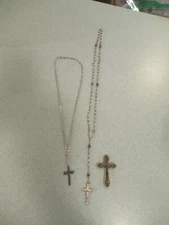 Miscellaneous vintage religious items: rosary, cross, and cross with chain