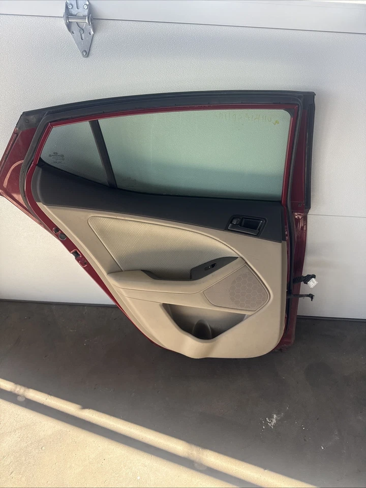 Panel interior de la puerta trasera izquierda del conductor Kia Optima 2011 Foto 3 de 4