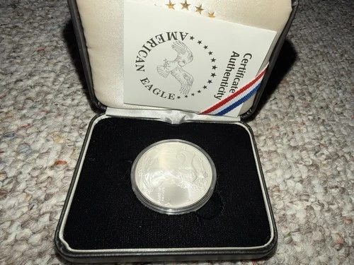 2004 American Silver Eagle 1 oz Uncirculated Silver Coin $1, in Capsule Case