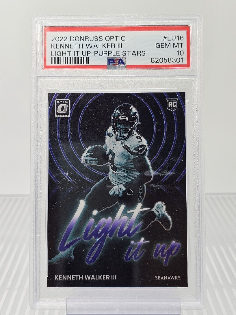 Kenneth Walker III Panini Donruss Optic Light It Up #LU16 Purple Stars