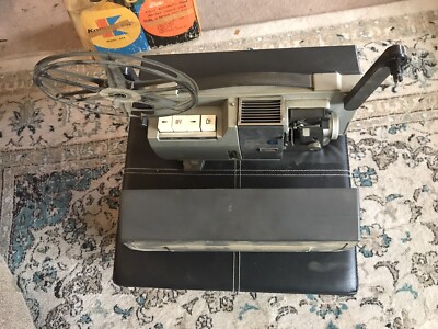E.J. Korvette Dual 8 movie projector- Lamp And Main Drive Belt Works Model 444