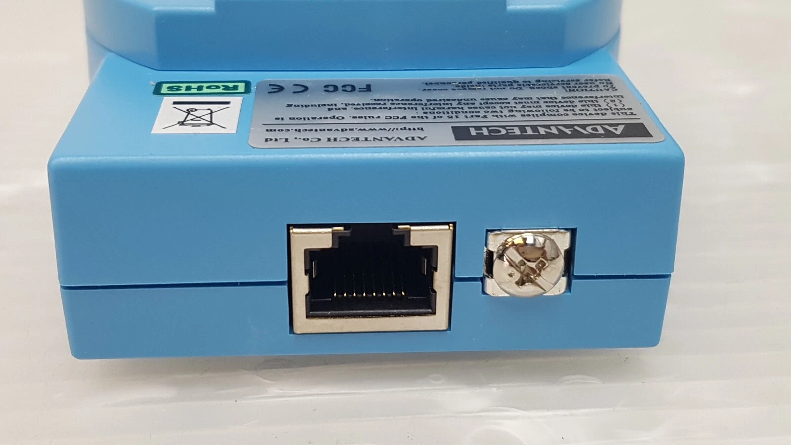 ADAM-4571 Ethernet end: RJ45 jack and ground screw under the Advantech label