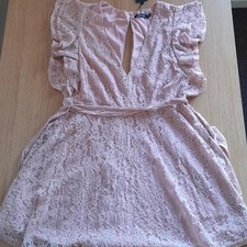 Pink lace mini dress with tie waist and ruffle sleeves