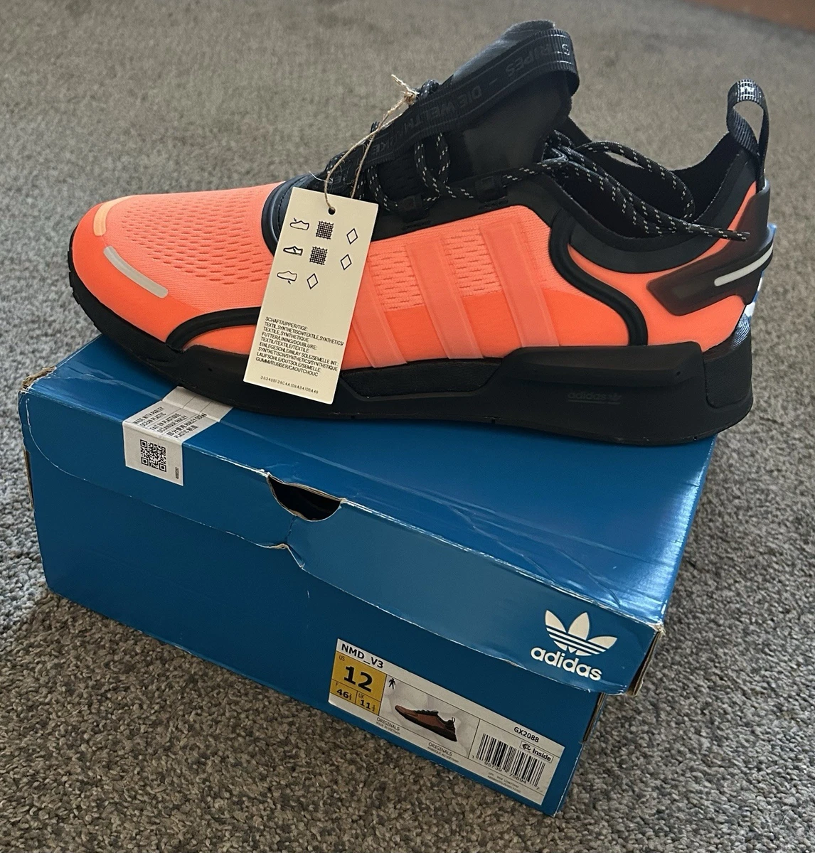 adidas gazelle silver green womens Adidas NMD R1 Core Black Solar Orange main image 1