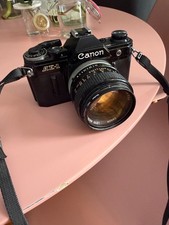 Canon AE-1 Black 35mm SLR Film Camera w/ 50mm f/1.4 FD Lens