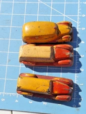 3 Vintage 1930's The Sun Rubber Co. Red & Yellow Rubber Toy Car
