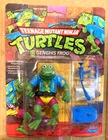 VTG. 1989  TMNT  TURTLES GENGHIS FROG   PUNCHED NEW GRADEABLE