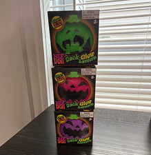 Nee Doh Jack-O-Lantern Glow-in-the-Dark Squeeze Toy, Green/Purple/Pink 3