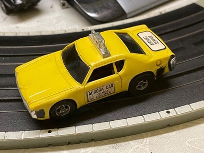 Faller AMS Aurora AFX -  Matador Airport Service Taxicab Gelb - Silikon HR Neu