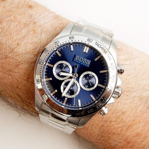 silver watch with blue face