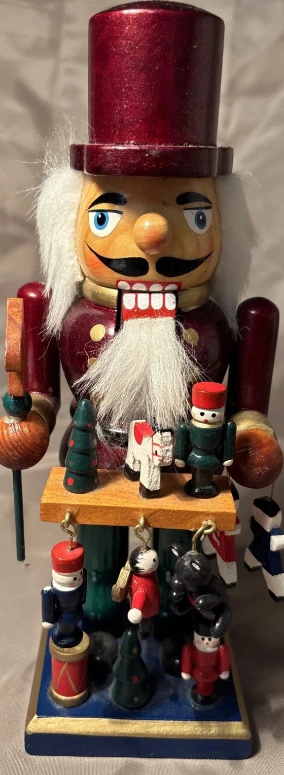 Merry Brite 2005 Burgundy Nutcracker Toy Maker Carpenter, CVS, 10" X 4” X 4”
Opens in a new window o